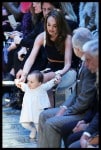 Tamara Ecclestone's baby tries to walk onto the catwalk at the Julien Macdonald show at London Fashion Week A/W 15-Day two