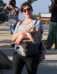 A Very Pregnant Milla Jovovich Hikes The Hills With Her Pups