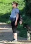 A Very Pregnant Milla Jovovich Hikes The Hills With Her Pups