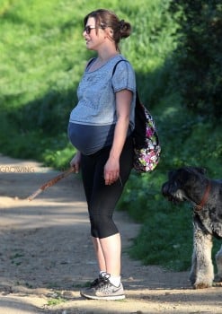 A Very Pregnant Milla Jovovich Hikes The Hills With Her Pups