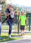 Gwen stefani and sons Apollo and Kingston at her boys soccer game
