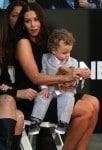 Kyla Weber Vaughn with son Vernon at husband Vince's  Hands and Footprints Ceremony in Hollywood