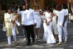 The Kardashian clan seen all dressed up in white leaving church on Easter Sunday in Calabasas