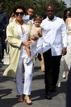 The Kardashian clan seen all dressed up in white leaving church on Easter Sunday in Calabasas