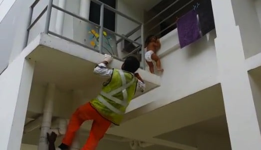 Road Workers Save Toddler Hanging From Balcony In Singapore