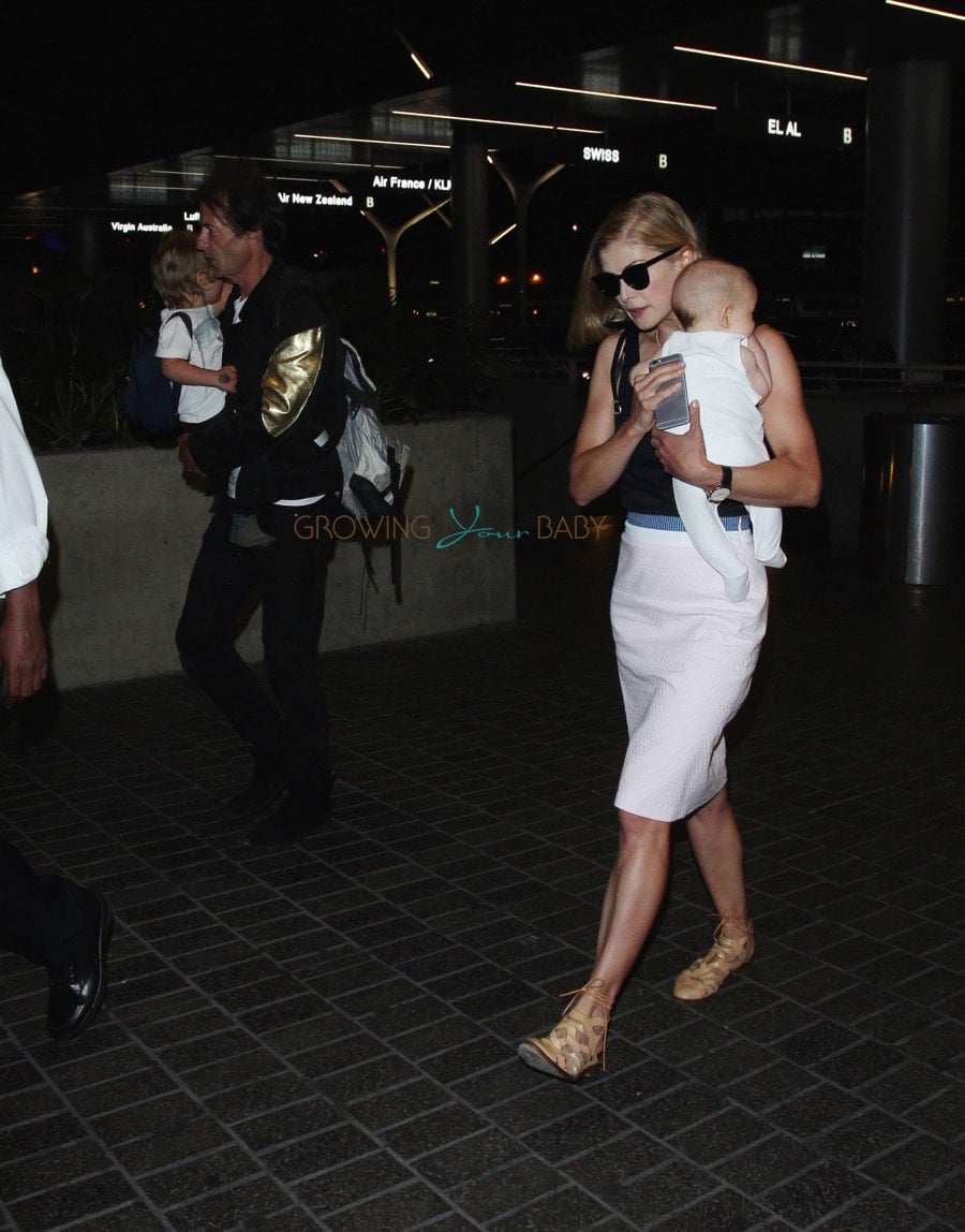 Rosamund Pike with son Atom at LAX Growing Your Baby