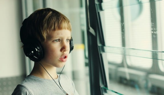 boy wearing headphones - autism