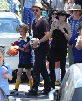 Brad Pitt and Angelina Jolie with daughters Zahara & Shiloh after a soccer game in LA
