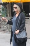 Ashlee Simpson shows her baby bump as she goes for juice with husband Evan Ross at Jamba Juice in Los Angeles