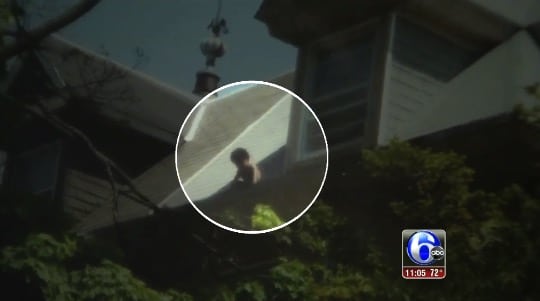 Toddler rescued from roof