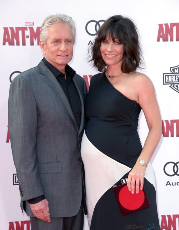 A Very pregnant Evangeline Lilly with Michael Douglas at Antman Premiere