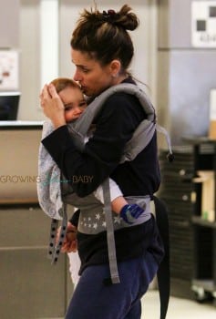 Amanda Peet at LAX with son Henry Benioff