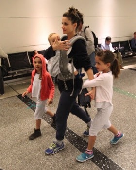 Amanda Peet travels with kids Molly, Frances and Henry Benioff