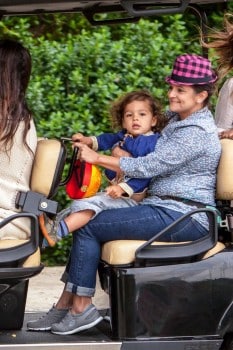 Camila Alves shuttles her  kids Vida and Livingston from a birthday party in a golf cart