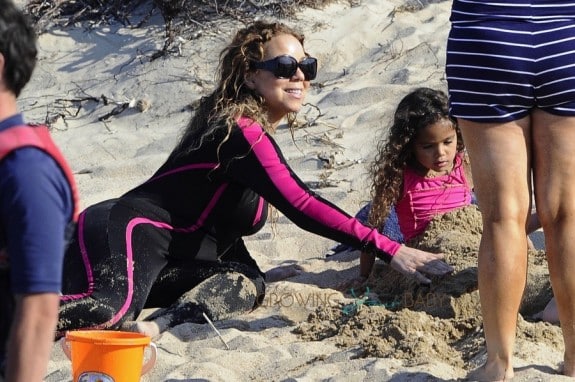 Mariah Carey at the beach with daughter Monroe in Sardinia