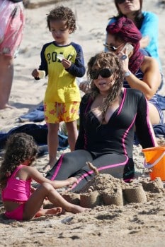 Mariah Carey at the beach with twins Moroccan and Monroe in Sardinia