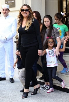 Mariah Carey exits her Paris Hotel with twins Moroccan and Monroe Cannon