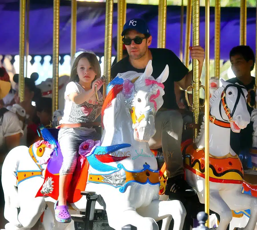 Paul Rudd and his daughter Darby enjoy a ride at King Arthur Carrousel