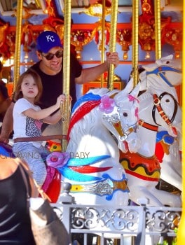 Paul Rudd and his daughter Darby enjoy a ride at King Arthur Carrousel