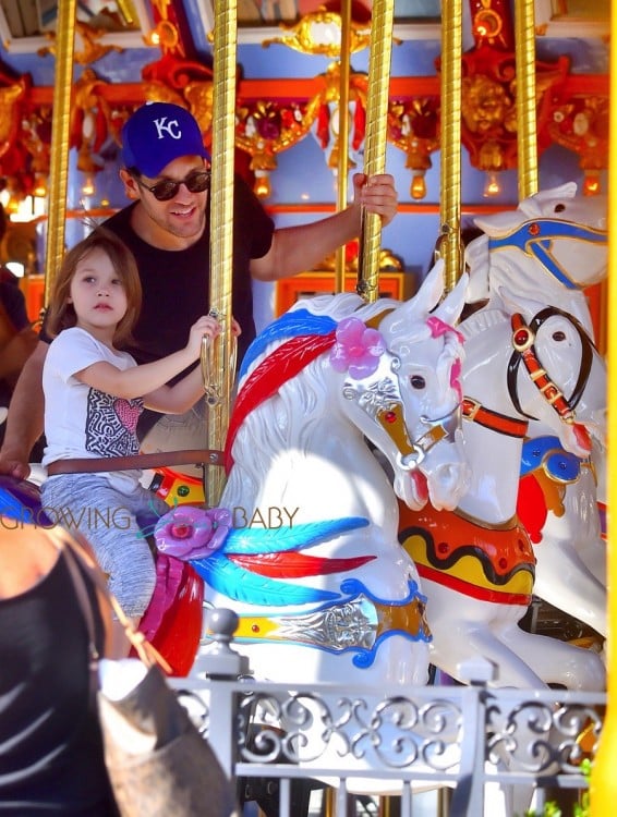Paul Rudd and his daughter Darby enjoy a ride at King Arthur Carrousel
