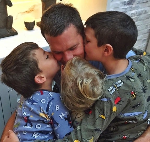 Tom Brady gets hugs from his kidsm John, Vivian and Ben