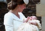 Duchess of Cambridge carrier Princess Charlotte in her Christening Gown