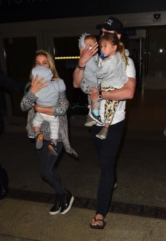 Elsa Pataky and Chris Hemsworth at LAX with their kids India, Tristan and Sasha