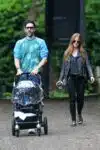 Isla Fisher and Sacha Baron Cohen take their 4-month-old baby Montgomery Moses Brian for a stroll