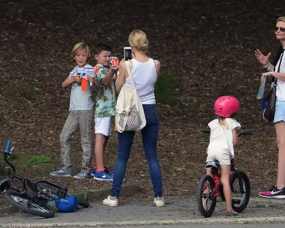Kelly Rutherford take a picture of son Hermes in Central Park