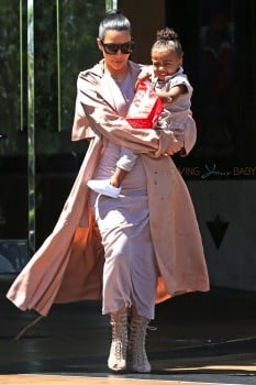 Kim Kardashian with daughter North leaving the movies