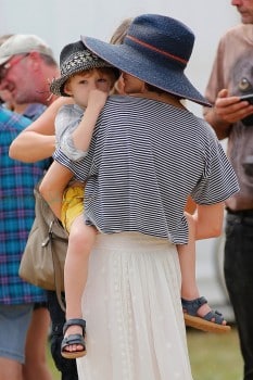 Marion Cotillard and her son Marcel cheer for her husband Marcel Canet during Longines Global Champions Tour
