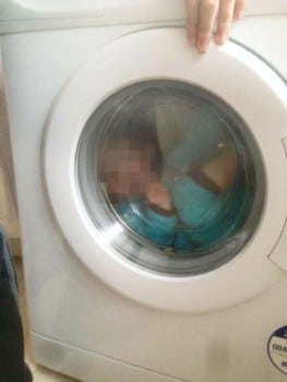 Mom posts picture of baby with Down Syndrome in washing machine