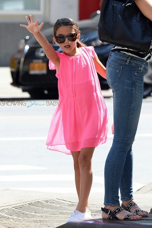 Suri Cruise hails a cab in NYC