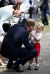 The Duke and Duchess of Cambridge with son Prince George at Princess Charlotte's Christening