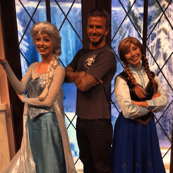 David Beckham poses with Frozen characters at Disneyland