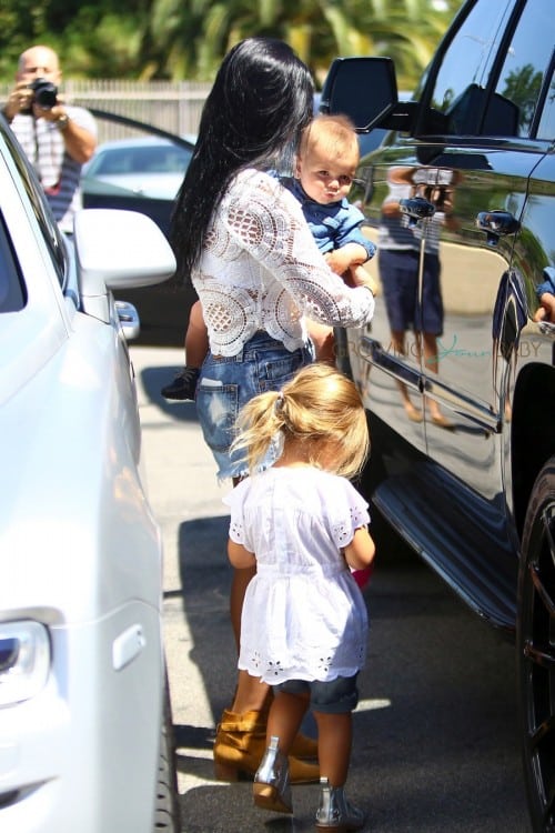 Kourtney Kardashian out at a birthday party with daughter Penelope & son Reign Disick