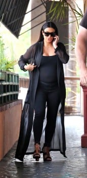 Pregnant Kim Kardashian and mother Kris Jenner match in black outfits as they enjoy lunch in Los Angeles