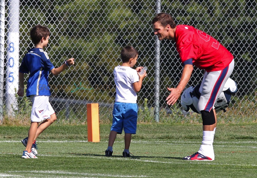 Tom Brady at Football practise with sons John and Ben