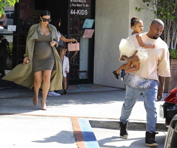Kim Kardashian and Kanye West leave ballet class with daughter North