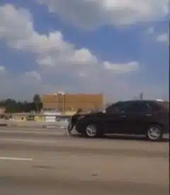 Motorists Film Video Of Pregnant Woman Clings to Car Driving on Freeway