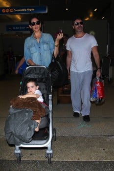 Simon Cowell and Lauren Silverman at LAX with son Eric