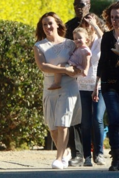 Alyssa Milano carries daughter Elizabella Bugliari on the set of her new commercial