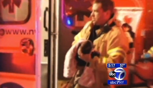 FDNY Lieutenant Adam Vilagos with 3-week old baby