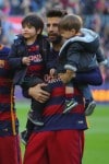 Gerard Pique with his sons Sasha and Milan at the La Liga match between FC Barcelona and Real Sociedad de Futbol