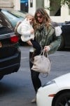 Gisele arrives at her NYC hotel with daughter Vivian Brady