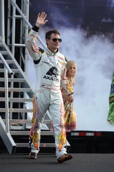 Jeff Gordon, driver of the #24 AXALTA Chevrolet, walks on the track with his daughter Ella Gordon prior to the start of the NASCAR Sprint Cup Series Ford EcoBoost 400 at Homestead-Miami Speedway