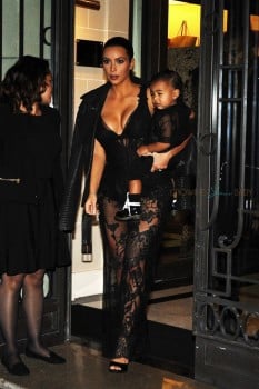 Kim kardashian and North West heading to Givenchy Fashion show dressed alike