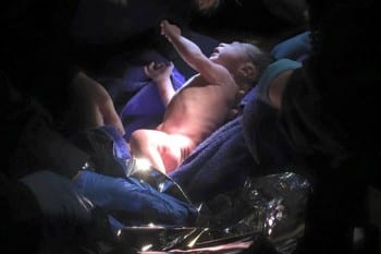 Newborn Abandoned in Manger at Queens Church - Christopher Ryan Heanue