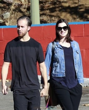 Newly pregnant Anne Hathaway and husband Adam Shulman step out in Las Angeles