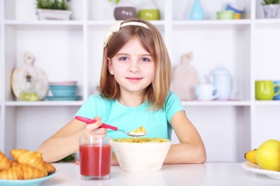 girl eating breakfast